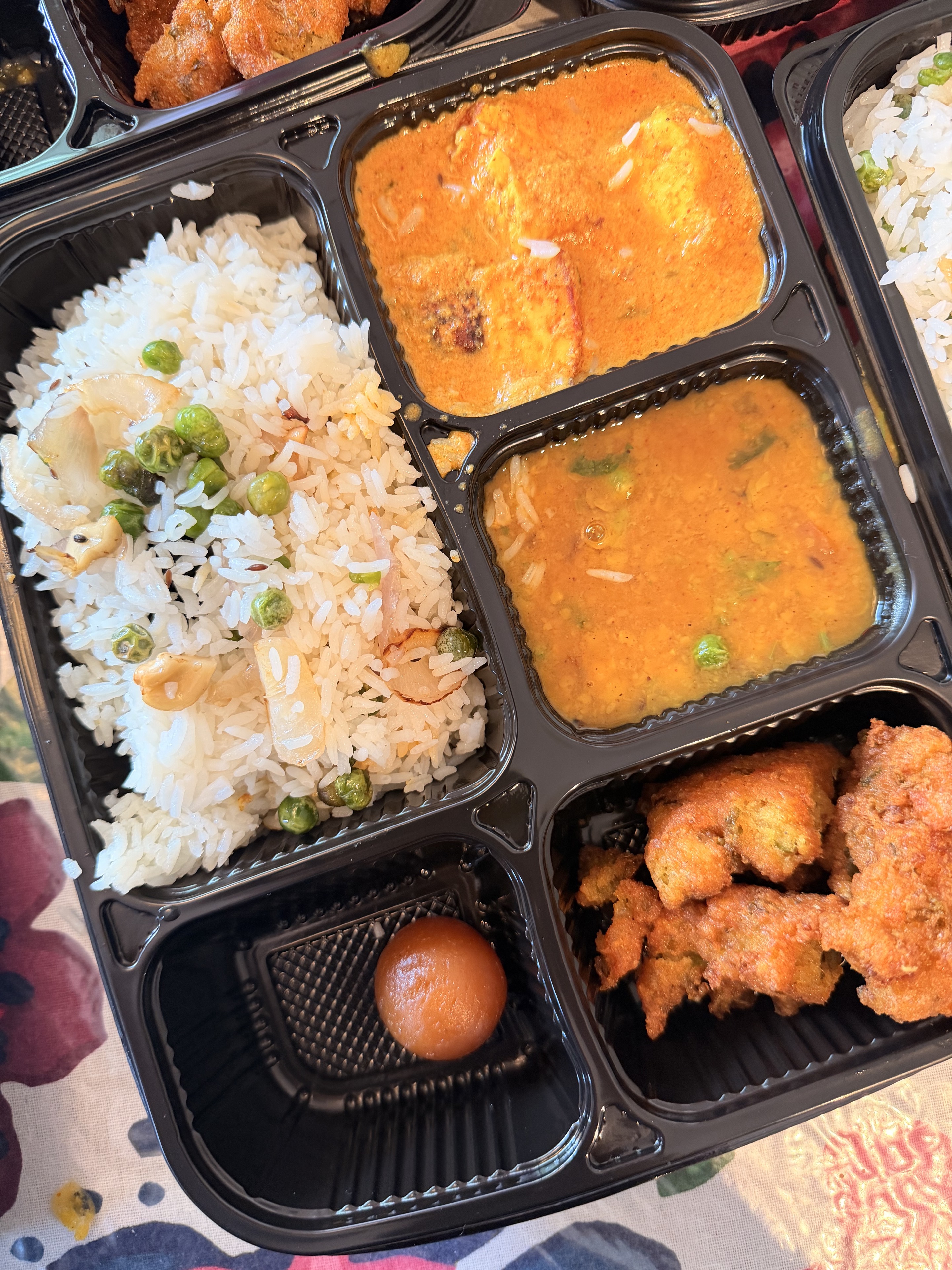 A complete vegetarian thali prepared by Mom's Delight