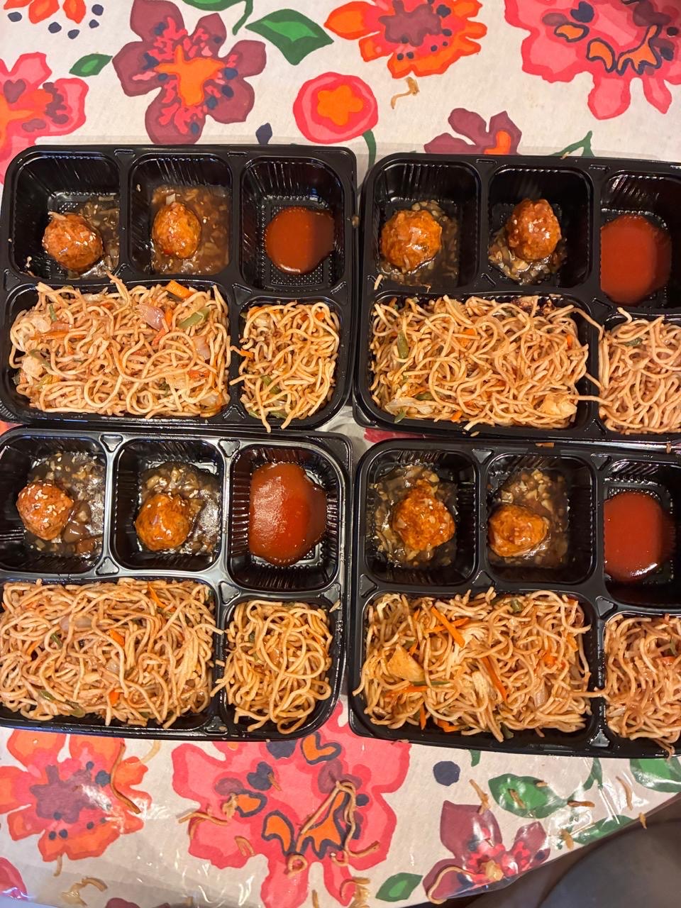 Hakka noodles meal boxes prepared by Mom's Delight